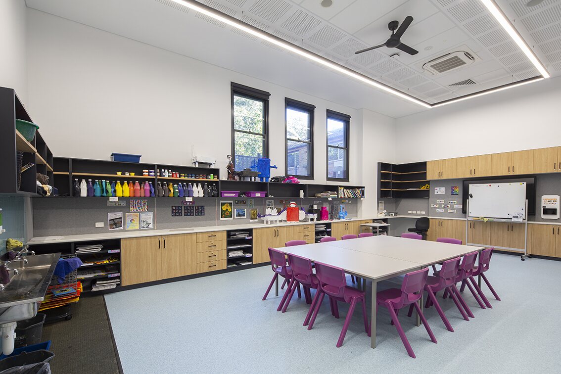 Custom classroom cabinetry and learning tables at St Edmund's College