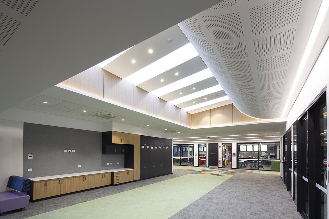 Bespoke cabinetry beneath a skylight at Northern Beaches Christian School